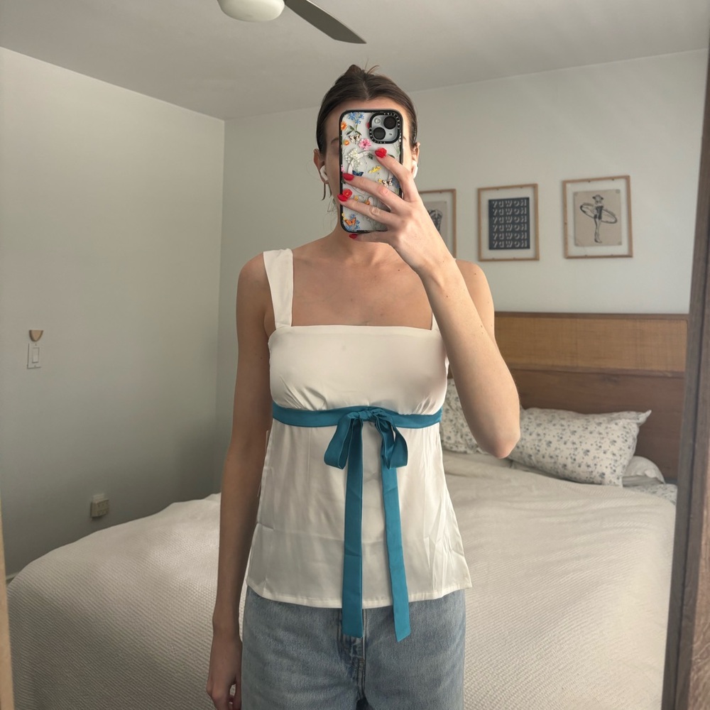 Bow, open back blouse